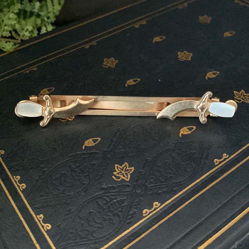 Vintage gold tone metal SLICK tie clip with Mother of Pearl daggers / knives